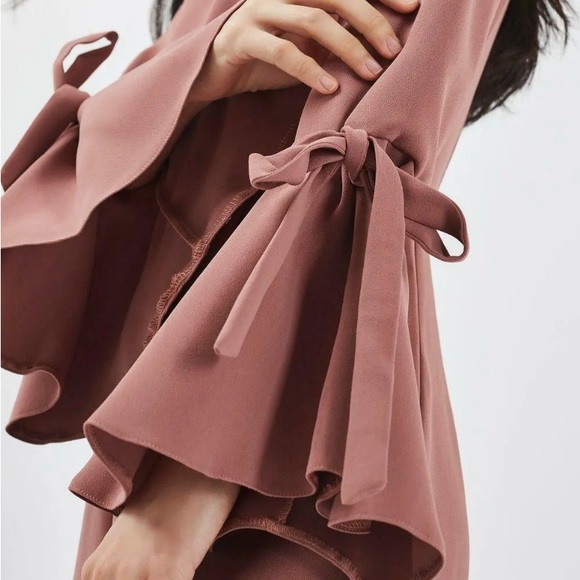 Top shop blush romper. Worn once. Amazing quality and a timeless look. - Picture 2 of 6